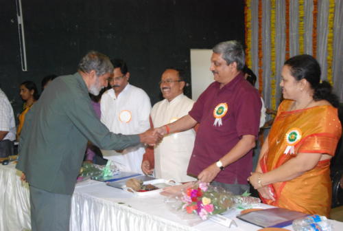 Hon. CM of Goa honouring the Deputy Sarpanch of Curtorim during 50th Panchayati Raj Day Celebration at Taleigao
