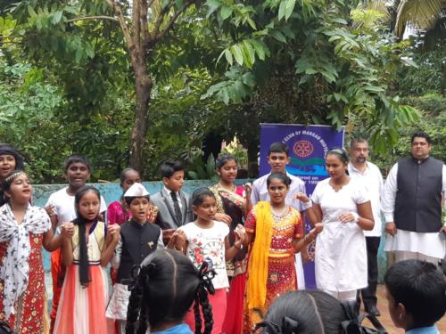 Local MLA participating in patriotic singing program of village children at a special Gram Sabha on the ocassion of Independence day at Curtorim